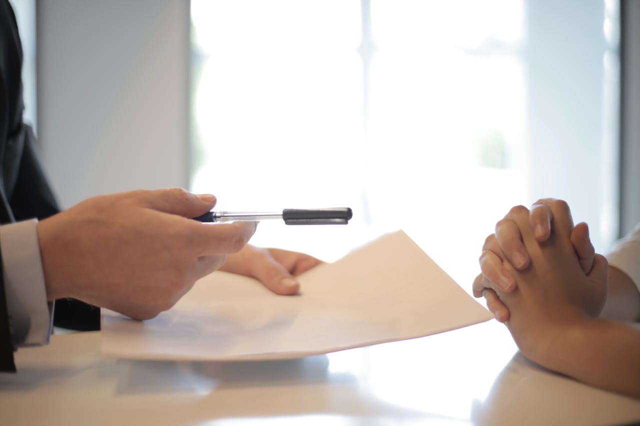medium-person-holding-pen-and-peper-and-person-with-hands-crossed medium-person-holding-pen-and-peper-and-person-with-hands-crossed